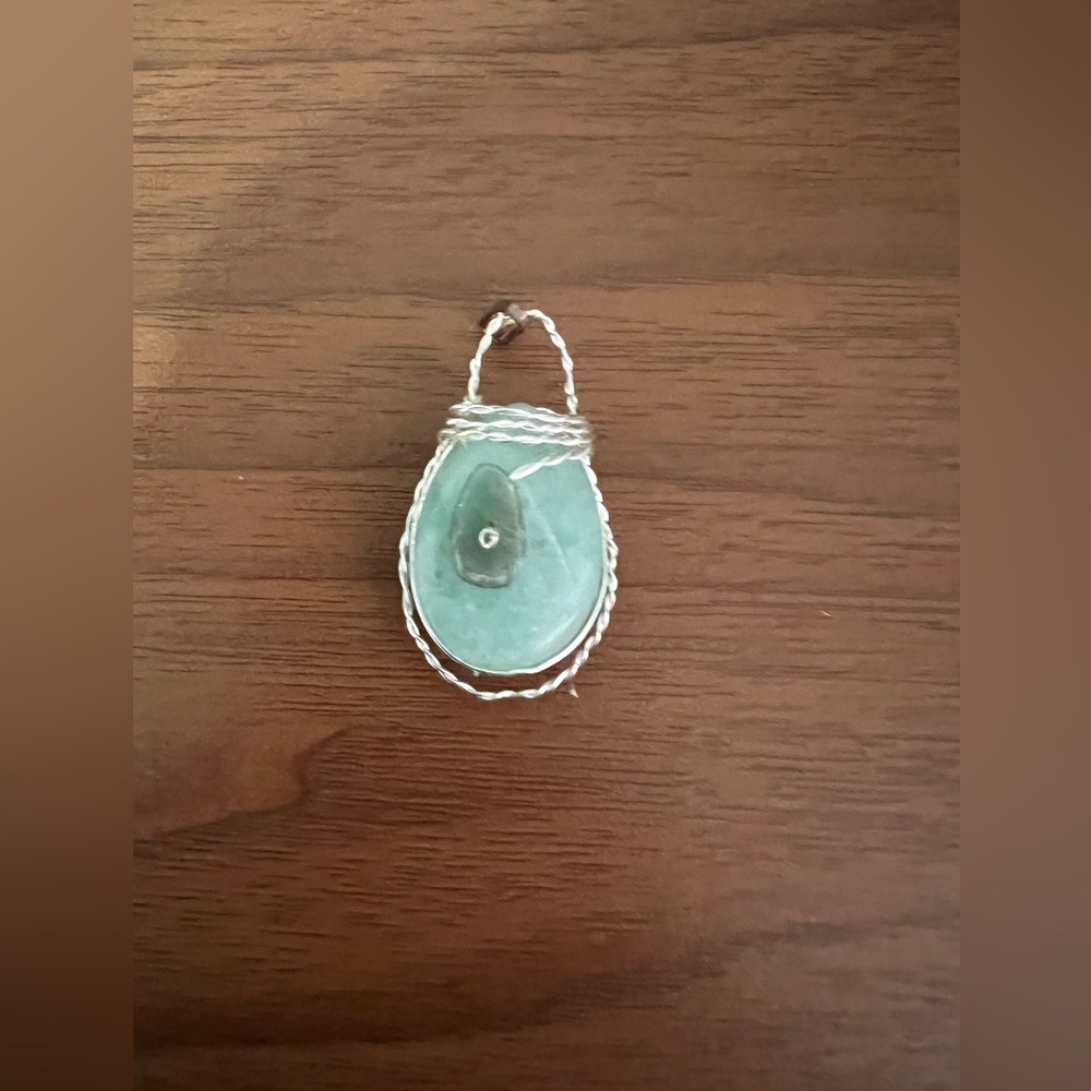 Sterling silver pendant with fluorite and jade.